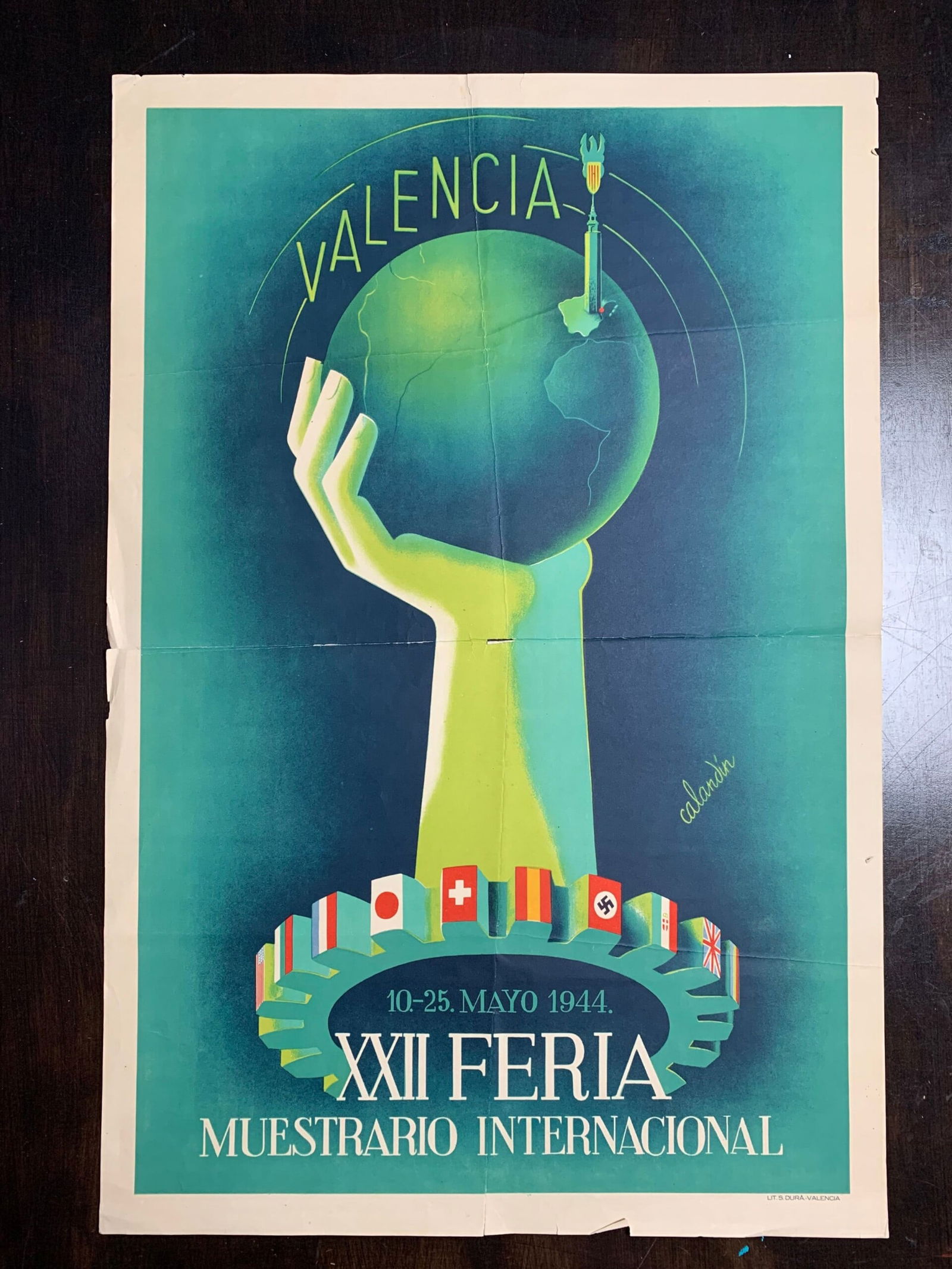 Valencia XXII Feria - J.Masia (1944) 17 x 25 Spanish Trade Fair Poster: Valencia XXII Feria - J.Masia (1944) 17 x 25 Spanish Trade Fair Poster Please refer to the attached photos to determine the condition of this original vintage item. Note: LB means Linen Backed. Ready