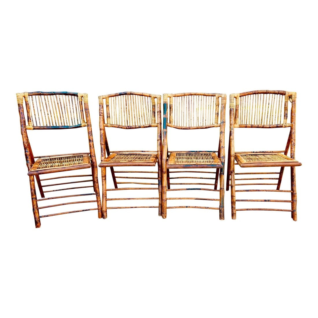 Vintage Bamboo Folding Chairs-Set of 4: Set of four vintage bamboo folding chairs with brass hinges. They are really authentic bamboo chairs. They are real authentic bamboo chairs. You could sings of age on pictures. Condition: