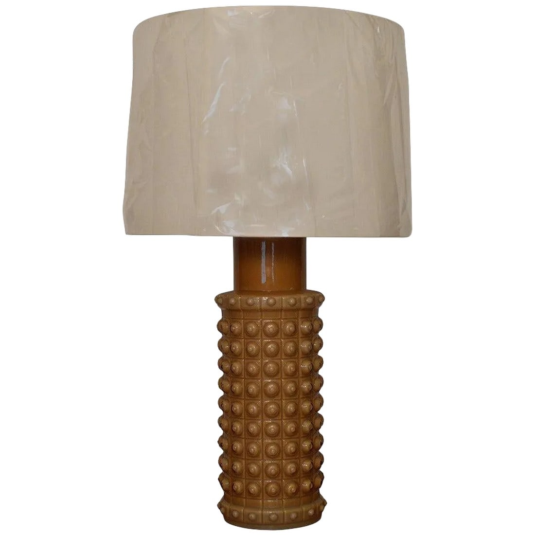 Mid Century Swedish Caramel Glass Table Lamp by Luxus: Swedish Caramel Glass Table Lamp by Helena Tynell for Luxus of Sweden. Includes new custom shade. Condition: Alterations: Original Condition Unaltered Imperfections: Some Imperfections Condition