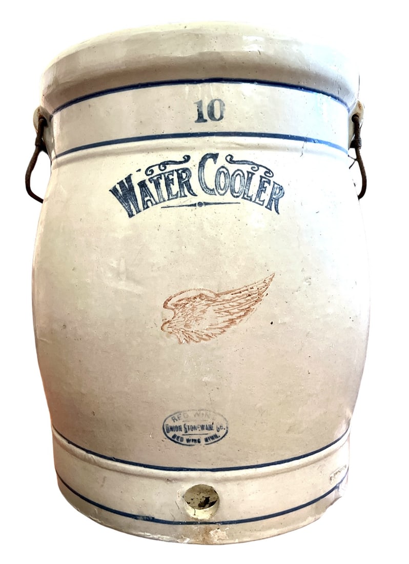 Antique Primitive 10 Gallon Red Wing Pottery Union Stoneware Water Cooler: Ten gallon Red Wing Union Stoneware water cooler circa 1915. The markings on the front are bold and the water cooler is clean. Original handles. Can be put to use as a water cooler by adding a
