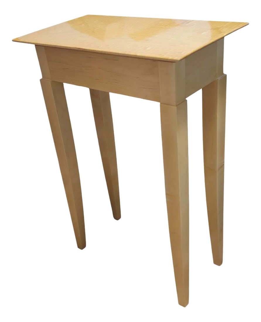 Curley Maple Side Table: This is a small production run side table. Non traditional joinery chosen to reduce price points. Featuring a elegant and simple design that uses solid maple and a solid curly maple top with