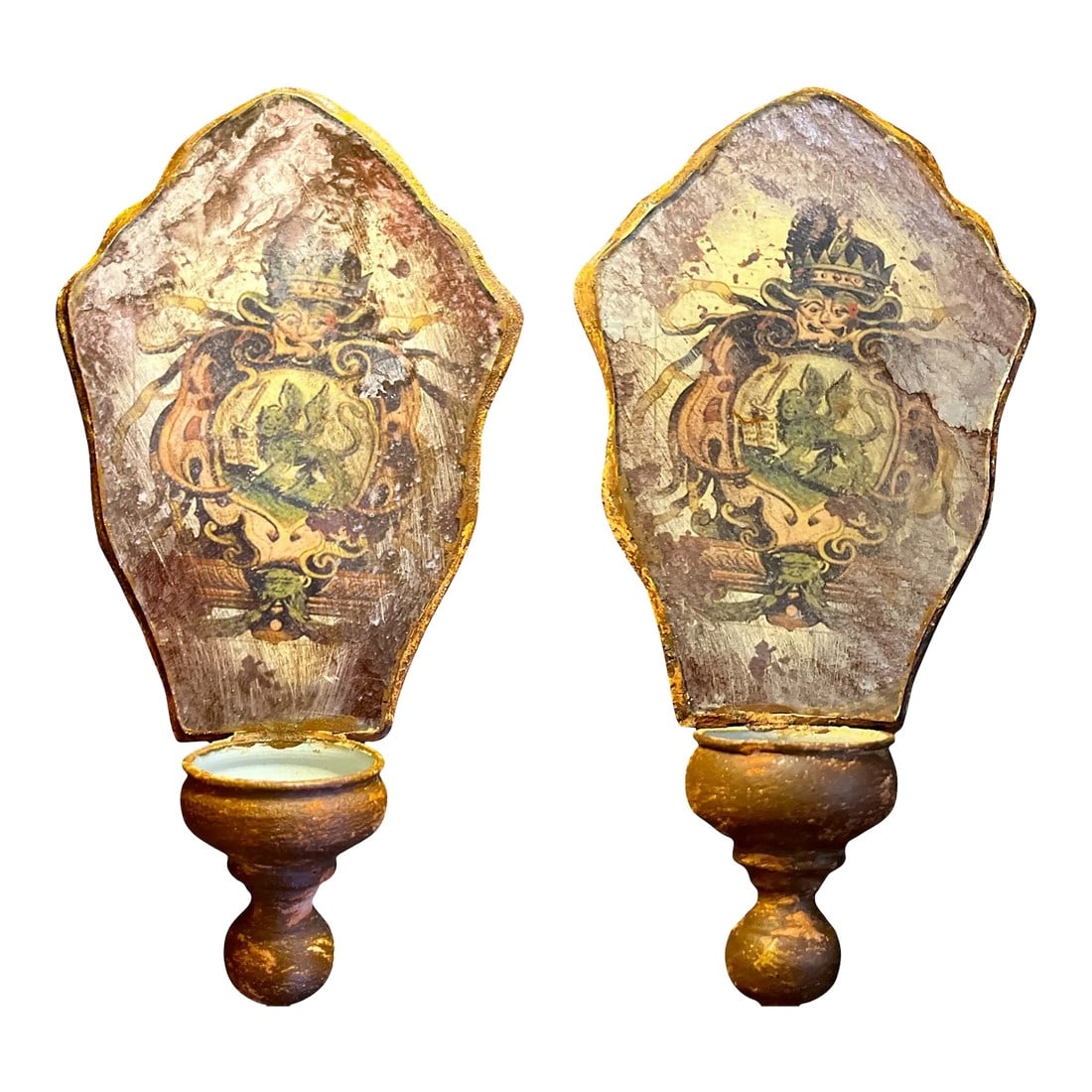 1950s Hand Painted Venetian Rustic European Coat of Arms Mirrored Shield Wall Bracket Candle Sconces: Pair of ornate, antiqued Venetian-style mirrored wall sconces with noble coat of arms design. Gold-gilding highlights the antiqued mirror shields frame a royal crest cartouche featuring a griffin