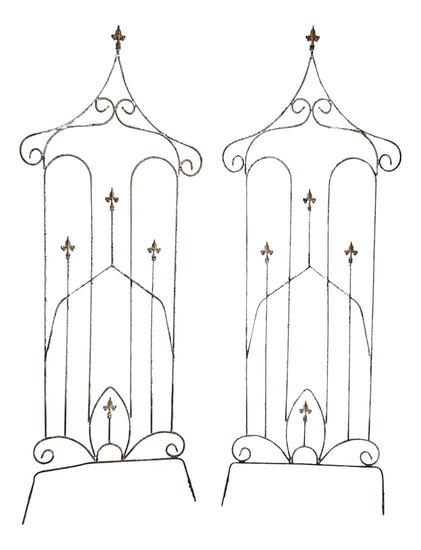 Early 20th Century Monumental French Antique Iron Trellis With Fleur De Lis and Pagoda Details - A P: Rare, monumental pair of French Iron trellises; each stands 7 feet, 6 inches and is nearly three feet wide. Both are embellished with six fleur de lis finials apiece, scrollwork and a pagoda style
