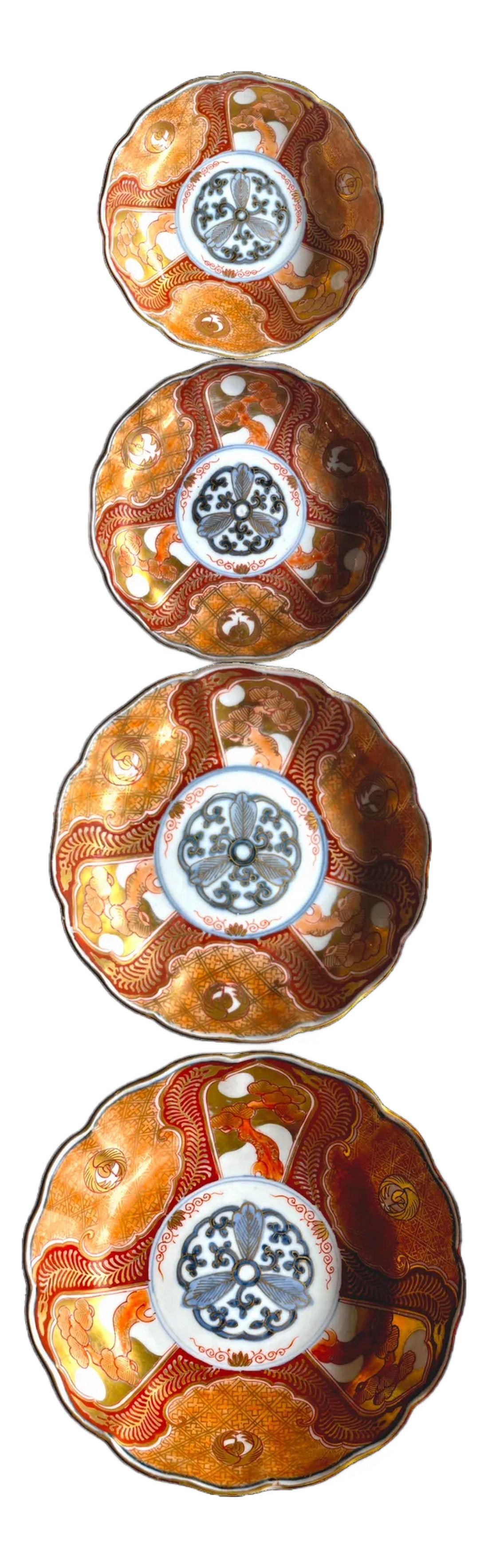 19th Century Japanese Meiji Period Marked Imari Fluted Footed Nesting Bowl Blue Fuku Mark Arita- Set: Stunning set of four nesting Imari bowls, richly decorated with traditional Japanese motifs. The pieces features a scalloped rim and symmetrical radial design that draws the eye inward. The interior