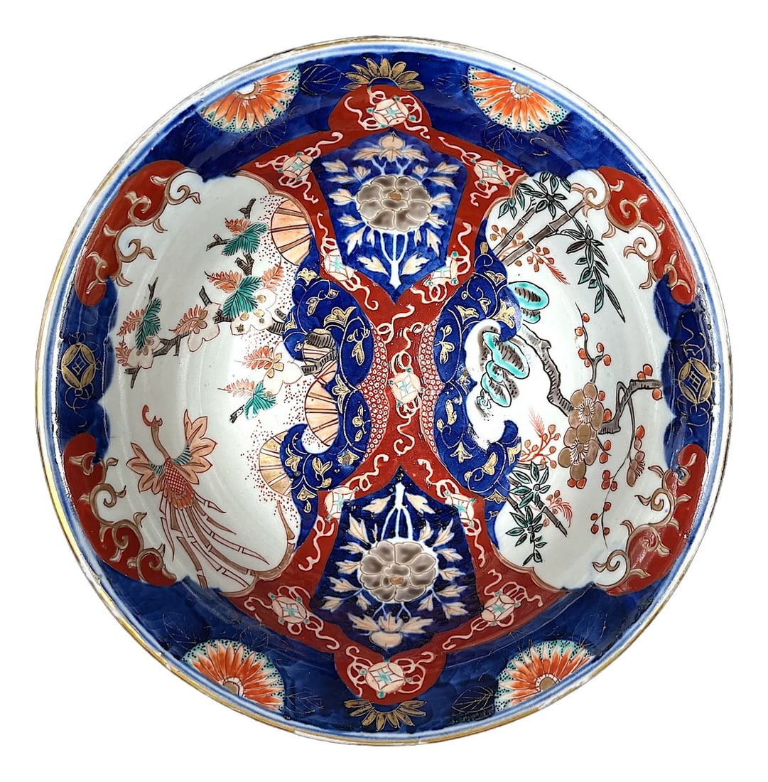 19th Century Meiji Period Japanese Cobalt Blue, Iron Red, and Gold Imari Bowl: 19th Century Japanese Imari bowl is a vivid example of the artistry and symbolism characteristic of antique Arita porcelain. The bowl features a striking color palette of deep cobalt blue, iron red,