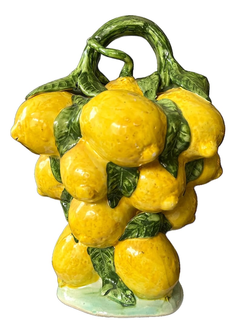1960s Spanish Majolica Lemons Hand Painted "Botijo" Pitcher Earthenware Water Jug: A showstopping piece of Mediterranean charm, this 1960s Spanish Majolica "botijo" pitcher is a celebration of craftsmanship and natural form. Hand-painted in vivid shades of citrus yellow and verdant