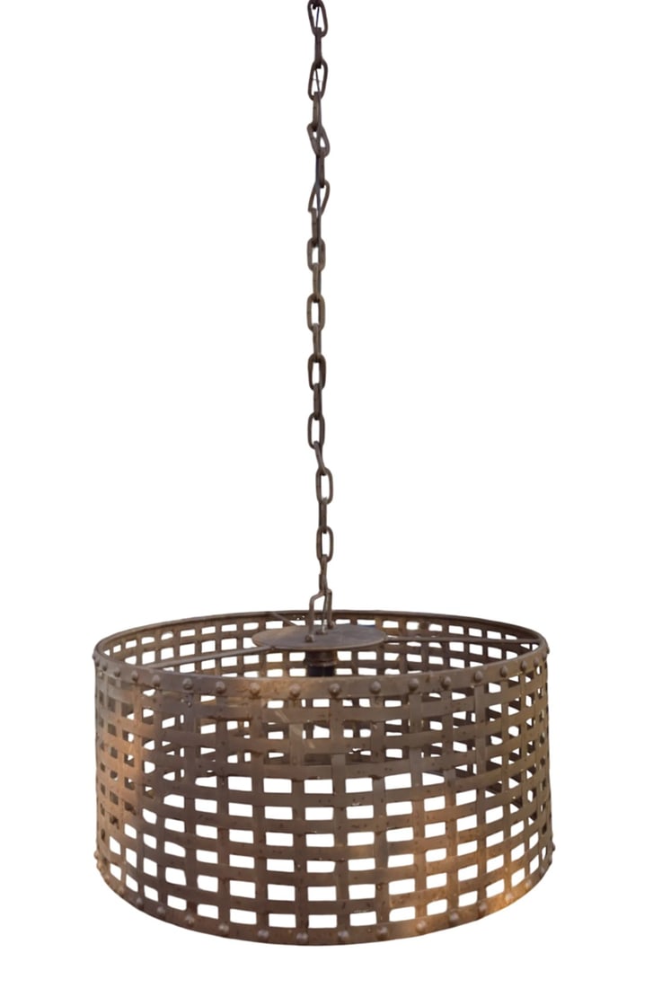 Rustic Riveted Oxidized Iron Metal Cage Barrel Pendant Light: Add bold, architectural character to your space with this striking vintage-style pendant light in the manner of Kelly Wearstler. Crafted from iron, this round fixture features an openwork grid cage