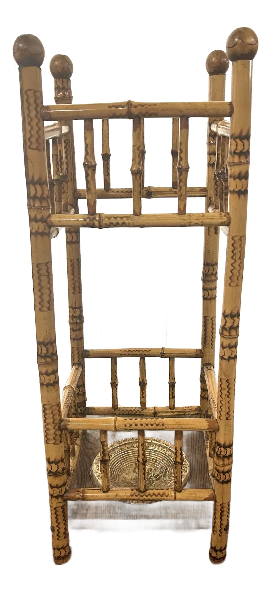 19th Century Antique English Victorian Burnt Bamboo Umbrella/Cane Stand Circa 1890: This English Victorian umbrella/cane stand is as colorful as it is practical! It incorporates ball finials, stretchers and balustrades and the bottom has a wooden base. The stand is lightweight and we