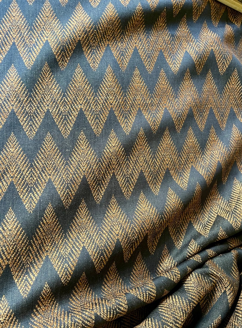 Holland & Sherry "Erebia" in Clove Linen/Wool Chevron - 6.5 Yards: A favorite pattern from Holland & Sherry Erebia in Clove DE13481. 6.5 yards. 72% Linen 28% Wool. Width 59" / Repeat: 2.5" H x 4.8" V. Condition: Imperfections: No Imperfections Condition Notes: New