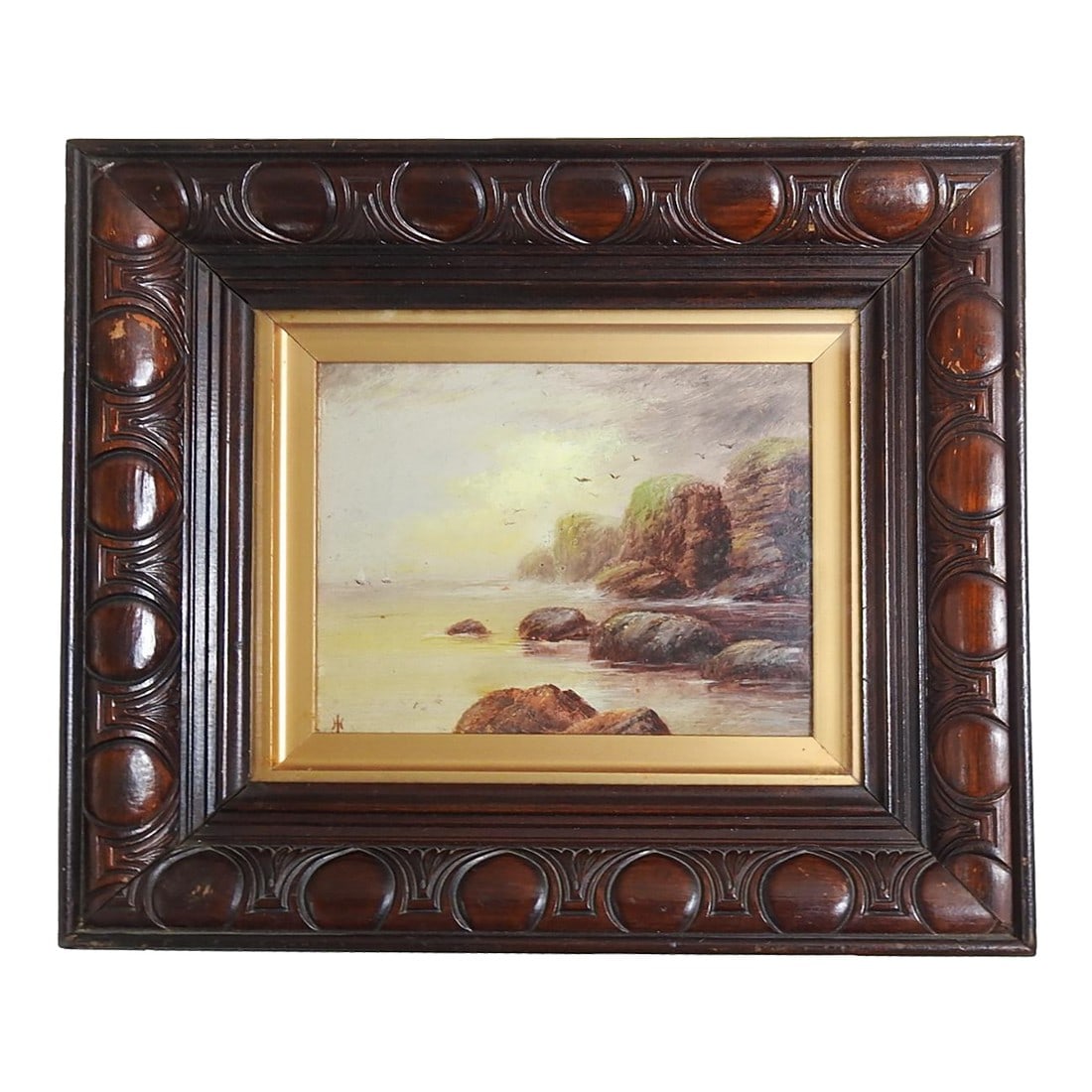 1911 Lands End Cornwall Rocky Coast Painting: 1911 oil on board painting of rocky sea coast. Initialed JH lower left corner, note on verso titled Morning at Lands End (Cornwall) painted by J. Hazelwood 1911. Displayed under glass in period