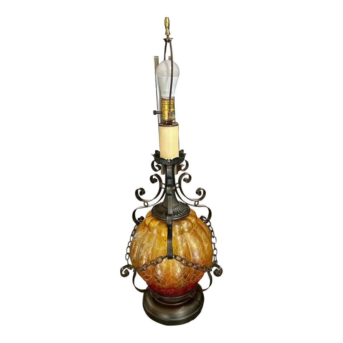 Mid 20th Century Spanish Revival Table Lamp, With 3-Way Lighting, Amberina Glass and Wrought Iron De: A classic example of the Spanish Revival era! The Amberina coloring of the glass, casts a warm and inviting glow"”while the black, hand-crafted, wrought iron adds a masculine and gothic vibe"