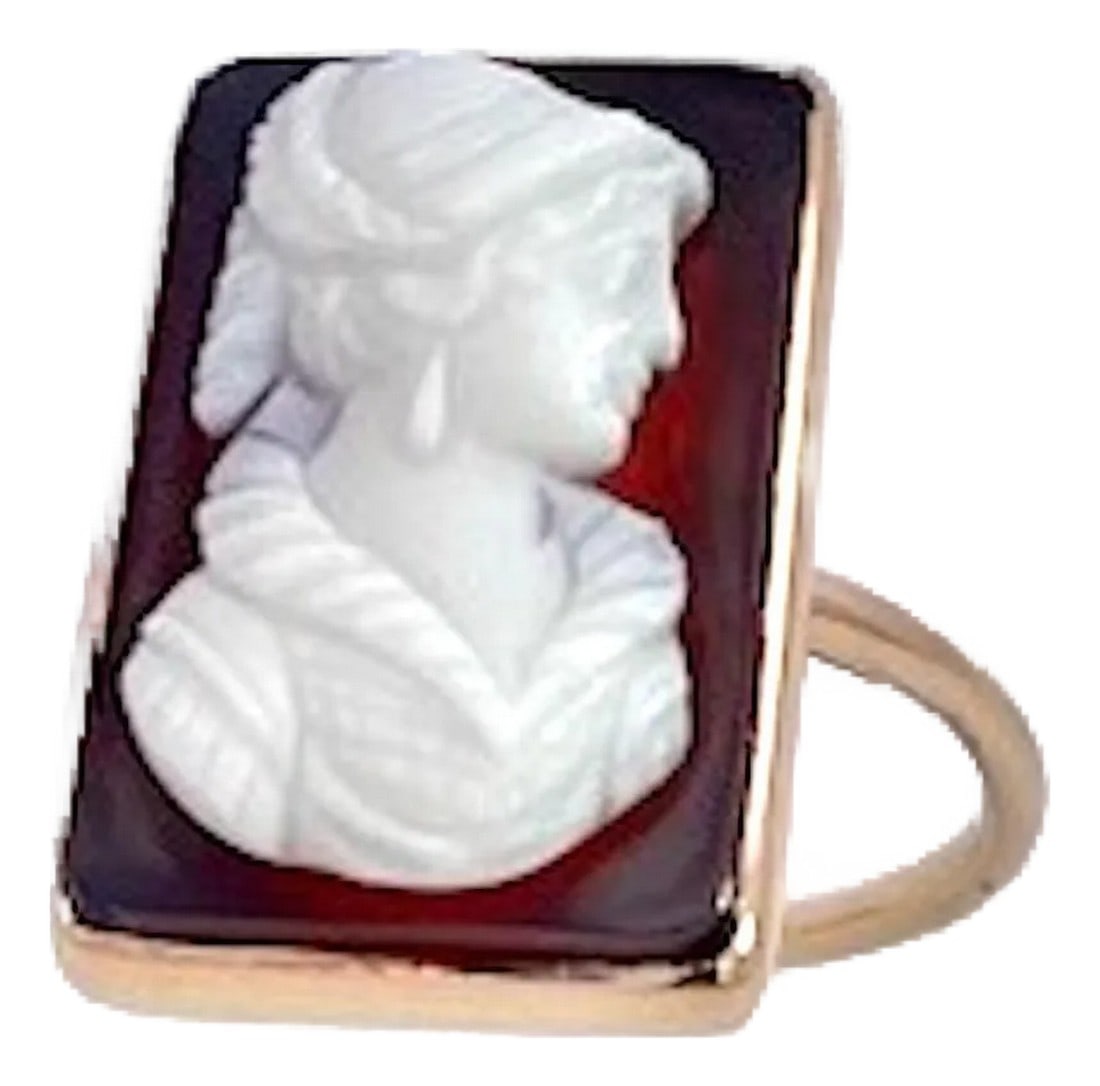 Late 19th Century Hardstone Cameo Ring 14k Yellow Gold, Size 6.5: This Hardstone Cameo Ring is done in 14K Yellow Gold. It is done Black Agate with a women in relief wearing Medieval costume. This ring is a rectangle rather than a round or oval format and weighs in