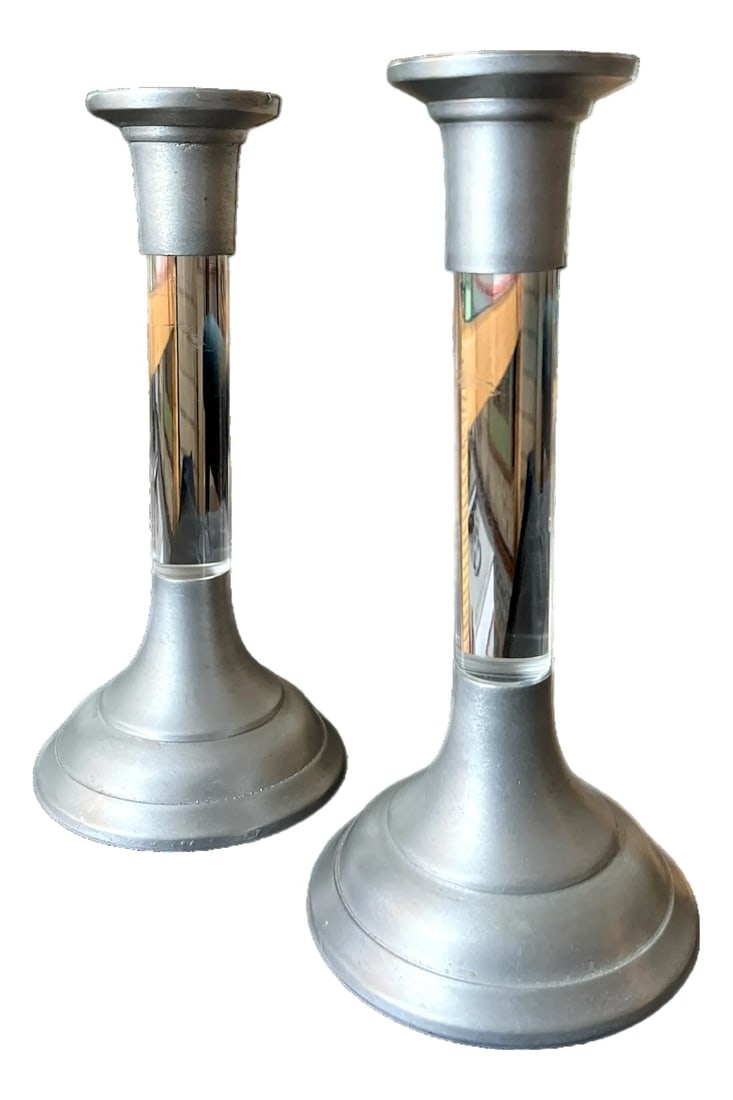 Pair of Vintage Lucite and Pewter Taper Candlestick Holders, 1970s: Elegant pair of taper candlestick holders circa the 1970s, crafted from a striking combination of clear lucite columns and pewter bases and cups. The design balances classical candlestick proportions