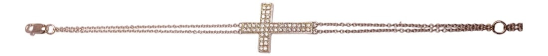 Diamond Cross Bracelet in 14K White Gold: Diamond Cross Bracelet in 14K white gold. Diamonds are E-F VS1-VS2, .50ct. Total weight is 2.4 grams. Bracelet wrist size is 6.5" (adjustable 5.5"). Proudly crafted by SIMON ARDEM artisans in New