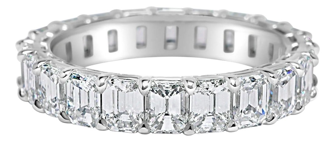 3.80 Carat Emerald Cut Diamond Wedding Eternity Band In Platinum, Size 5.5: Diamond Eternity Band set in Platinum. 22 Emerald cut diamonds are D-E-F VVS2-VS2. Carat weight: 3.80 ct. Total ring weight: 4.5 grams. Ring size: 5.5. Proudly crafted by SIMON ARDEM artisans in New