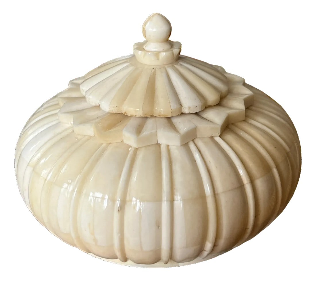Carved Bone Lidded Snuff Box | Neoclassical Ribbed Form | 19th–Early 20th C.: Sculptural carved bone snuff box with a domed, ribbed body and stepped lid topped by a turned finial. The form recalls Neoclassical and Indo-Colonial design, with strong architectural symmetry and a
