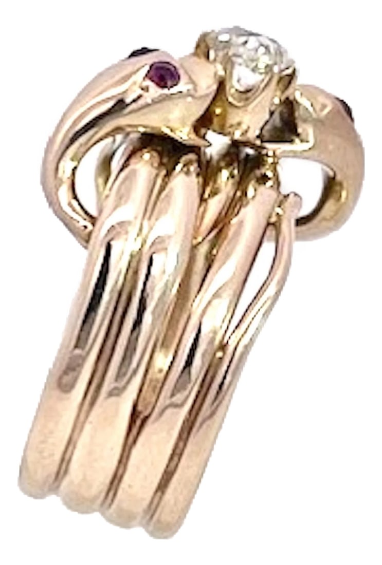 1950s Double Snake Ring Lovers Knot: This snake ring is a lovers knot as it depicts 2 snakes wrapped together. The center holds a Diamond and the snakes have 4 Ruby Eyes not tested. There are 4 bands together and the ring is a size