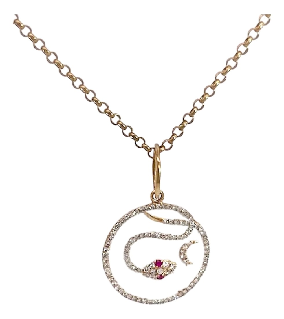 1970s Snake Pendant Diamond Ruby Crescent 14k: This pendant is sweet as it is round 2cm on an enamel base with a snake and crescent moon. The snake is set with Diamonds as is the crescent moon and the circle is covered in Diamonds as well. 