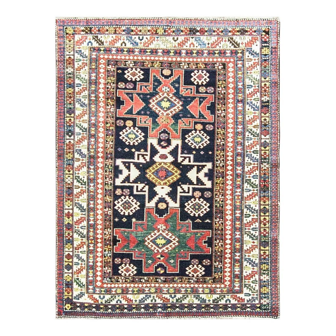 Antique Caucasian Lesghi Star Rug: This beautiful antique Caucasian Lesghi rug features a striking deep blue field accented by rich green, soft ivory, and rusty red tones. The design is centered around three large, bold Lesghi star