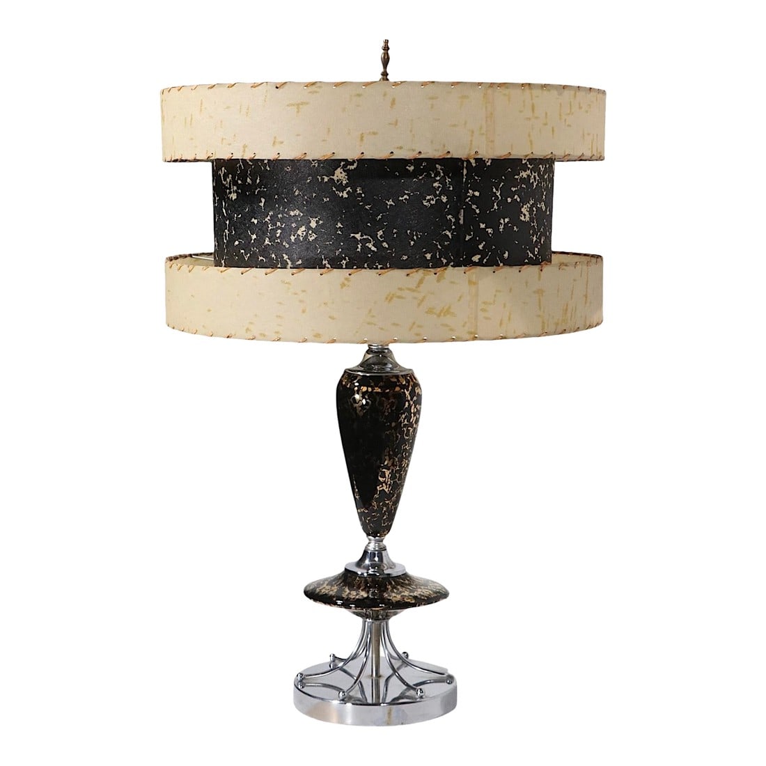 1950's Mid Century Table Lamp With Original Three Tier Fiberglass Shade: Incredible mid century ceramic, chrome and fiberglass table lamp, made in USA circa 1950's. The lamp features a chrome base, which supports a teardrop form black and gold ceramic body and exceptional