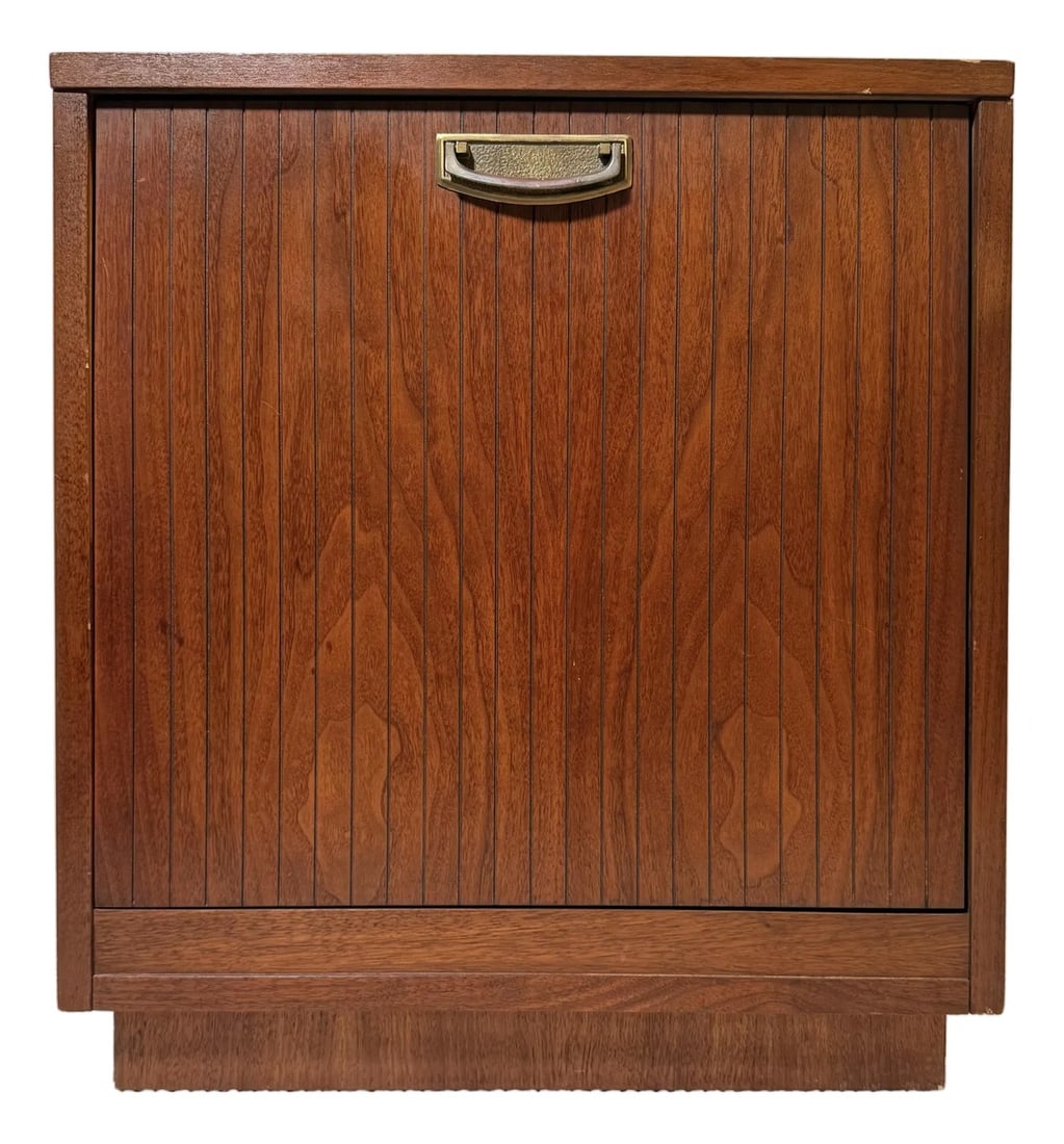 1960s Mid-Century Lane Walnut Record Cabinet, Drop-Front (1963): Designed by Lane Furniture and manufactured in 1963, this mid-century walnut drop-front cabinet offers streamlined storage with a compact footprint. Vertical slat detailing and a brass pull give the p