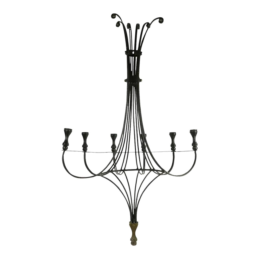 Large Mid Century Iron Brass and Wood Candle Sconce: Large 6-light candle sconce of wrought iron, brass, and wood. The sconce has a wrought iron structure, with turned wood candle cups, and cast brass trim. It is large scale making it a very impressive