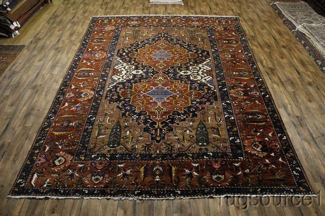 Antique 12X17 Bakhtiari Persian Rug: Title:Antique 12X17 Bakhtiari Persian RugOrigin:A Beautiful Genuine Iran ( Persia ) Bakhtiari rug is Hand Knotted by skillful weavers in Iran ( Persia ) with 100% Wool Material. This rug is in Very
