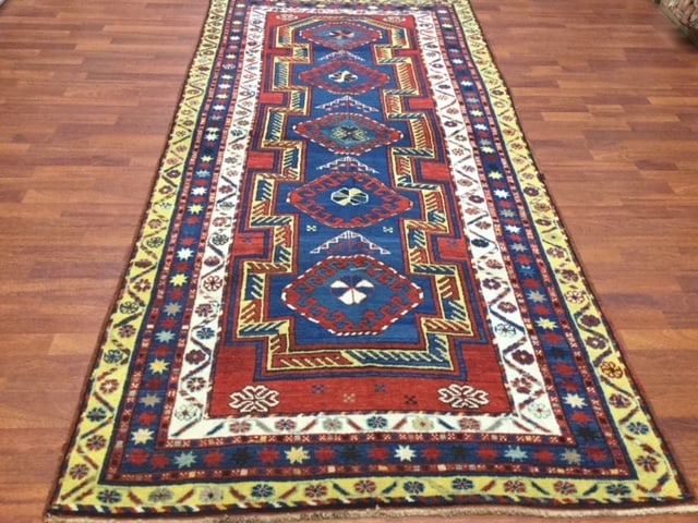 Antique Kazak Caucasian Rug-3208: Title:Antique Kazak Caucasian Rug-3208 Description:Southwest Caucasian,size 8'.8" by 4'.2",circa 1920,key /Orducth, interconnected rectangularmedallion over the midnightblue,a vase shped octagonal pro