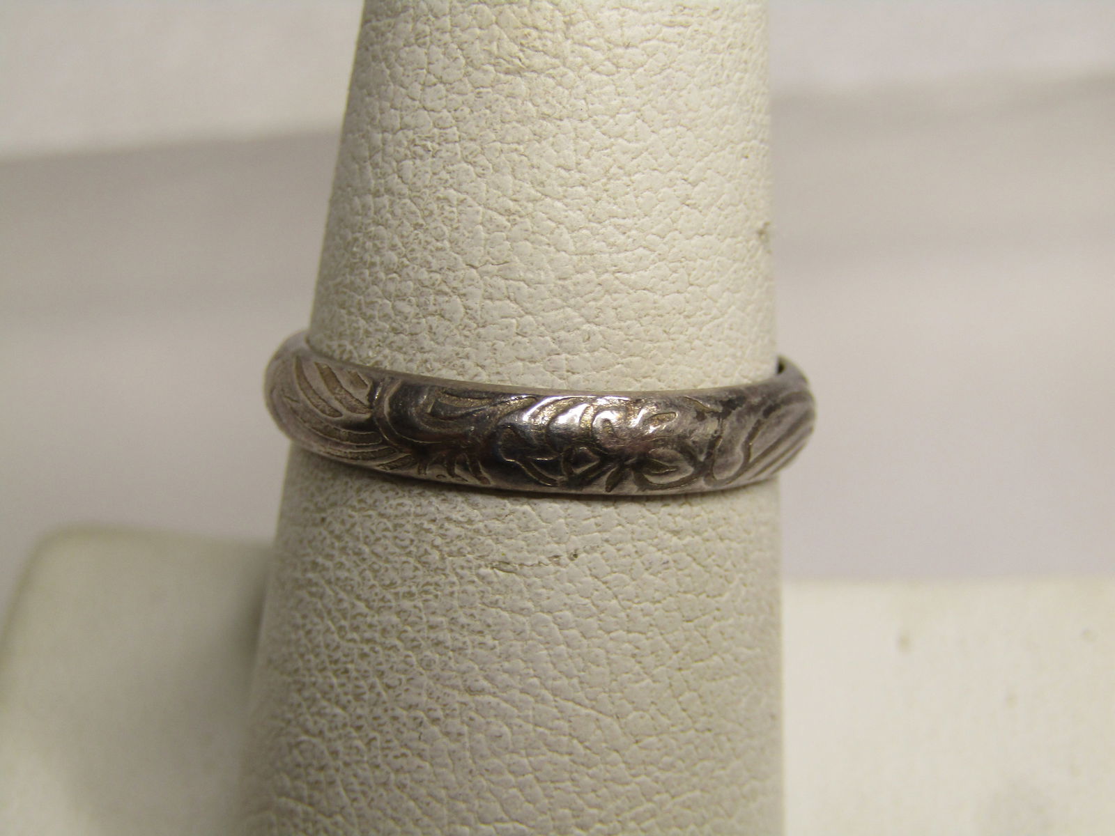 Vintage Sterling Floral Etched Band Ring, Sz. 7.75, 1960's-1970's: Vintage Sterling Floral Etched Band Ring, Sz. 7.75, 1960's-1970's, possibly slightly earlier. This is domed with a blossom and scrolled design. It is appx. 3.5mm wide. It is marked .925 and tests