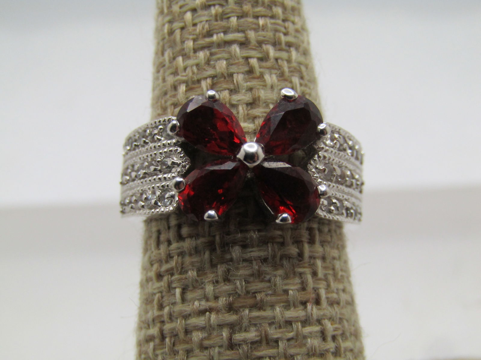Silver Plated Tourmaline Floral or Butterfly & CZ Wide Ring, Sz. 7, 1990's: Silver Plated Tourmaline Floral & CZ Wide Ring, Sz. 7, 1990's. This has the look of both a butterfly (minus the head an antenna) or floral blossom. It has four pear-shaped stones that are believed