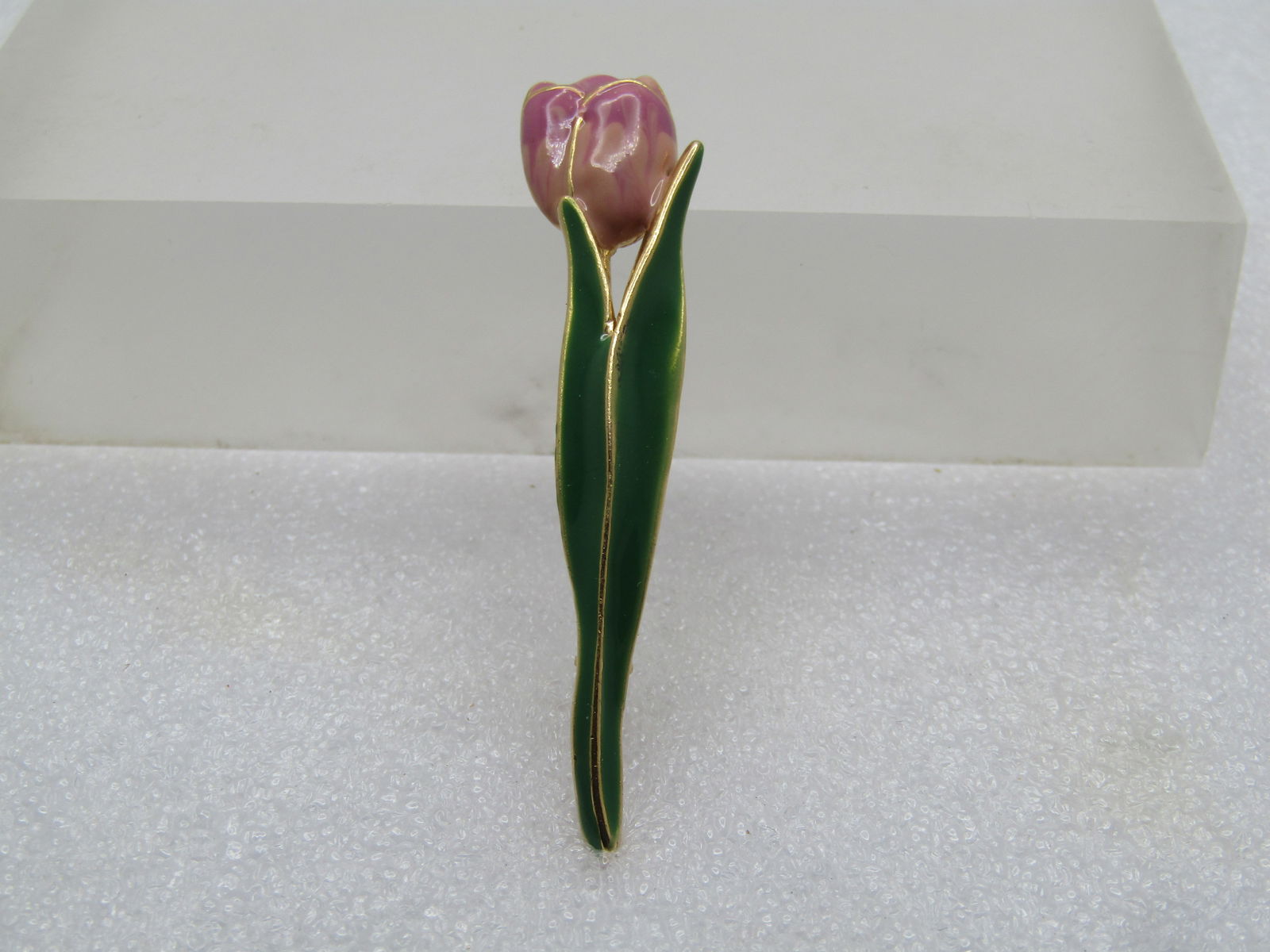 Vintage Tall Enameled Tulip Brooch, 1960's-1970's: Vintage Tall Enameled Tulip Brooch, 1960's-1970's, Long double green enameled leaves with pink and lavender tuip blossom with gold outlines. It is appx. 2,5" tall and 1/2" wide. Gold tone with