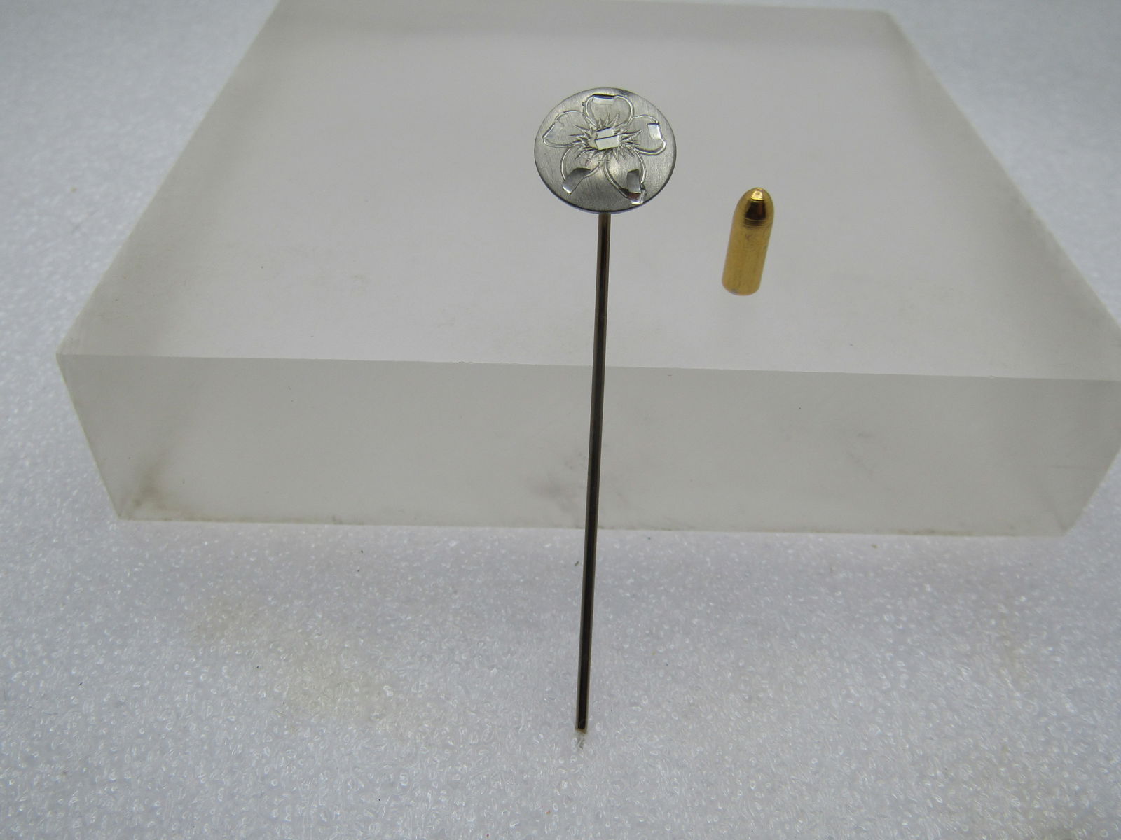 Vintage Hand Engraved Floral Stick Pin, Pewter, Safety Cap, 1960's-1970's: Vintage Hand Engraved Floral Stick Pin, Pewter, Safety Cap, 1960's-1970's. This is appx. 2.5" long with a 1/2" rounded and domed pewter top with hand engraved blossom design. It is marked Hand