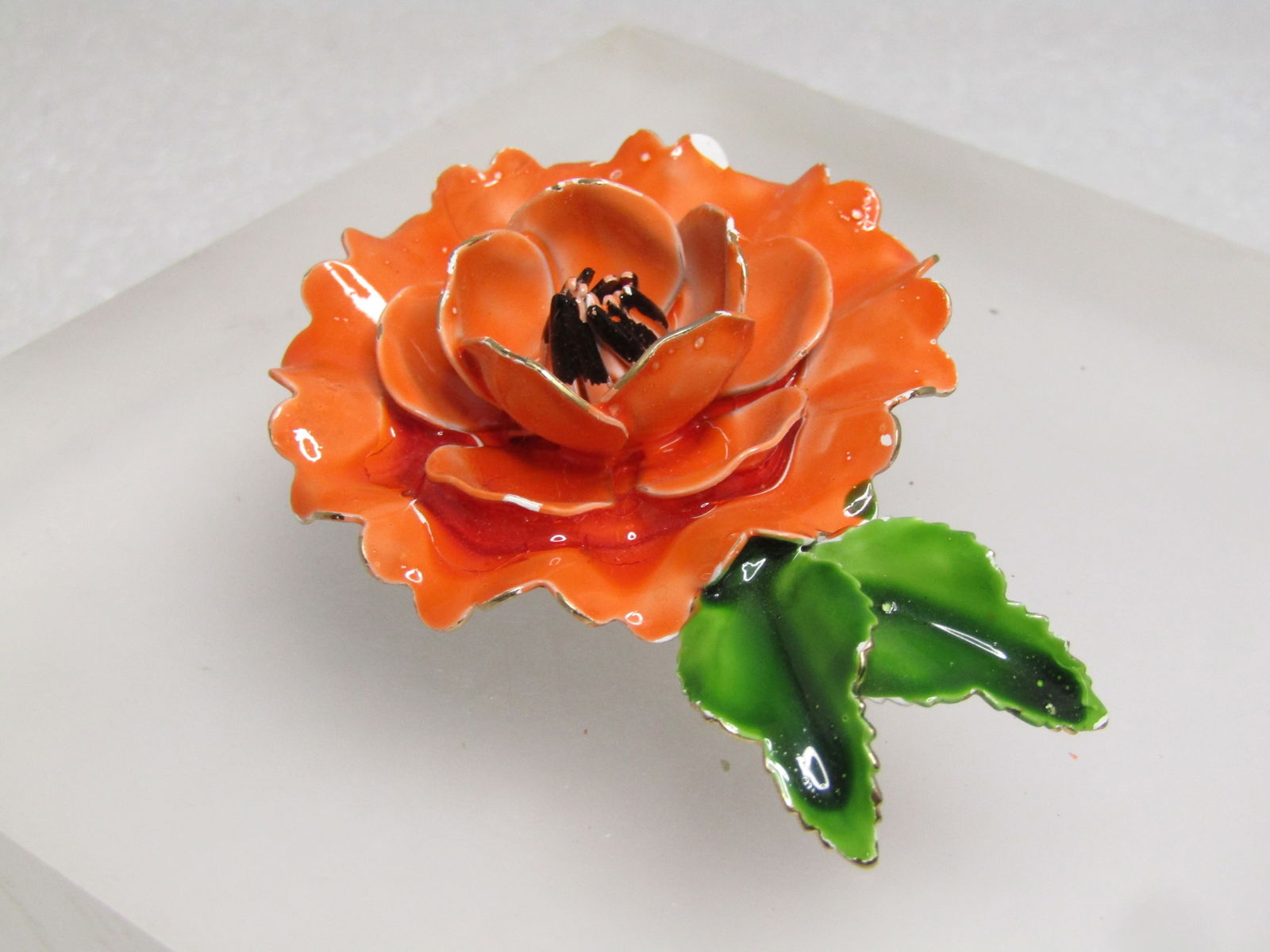 Vintage Orange Enameled Floral Brooch, Signed Pastelli, 1960's: Vintage Orange Enameled Floral Brooch, Signed Pastelli, 1960's. This is a blossom with three layers with the center petals turned upward and the the center anthers pointing up and tipped in black