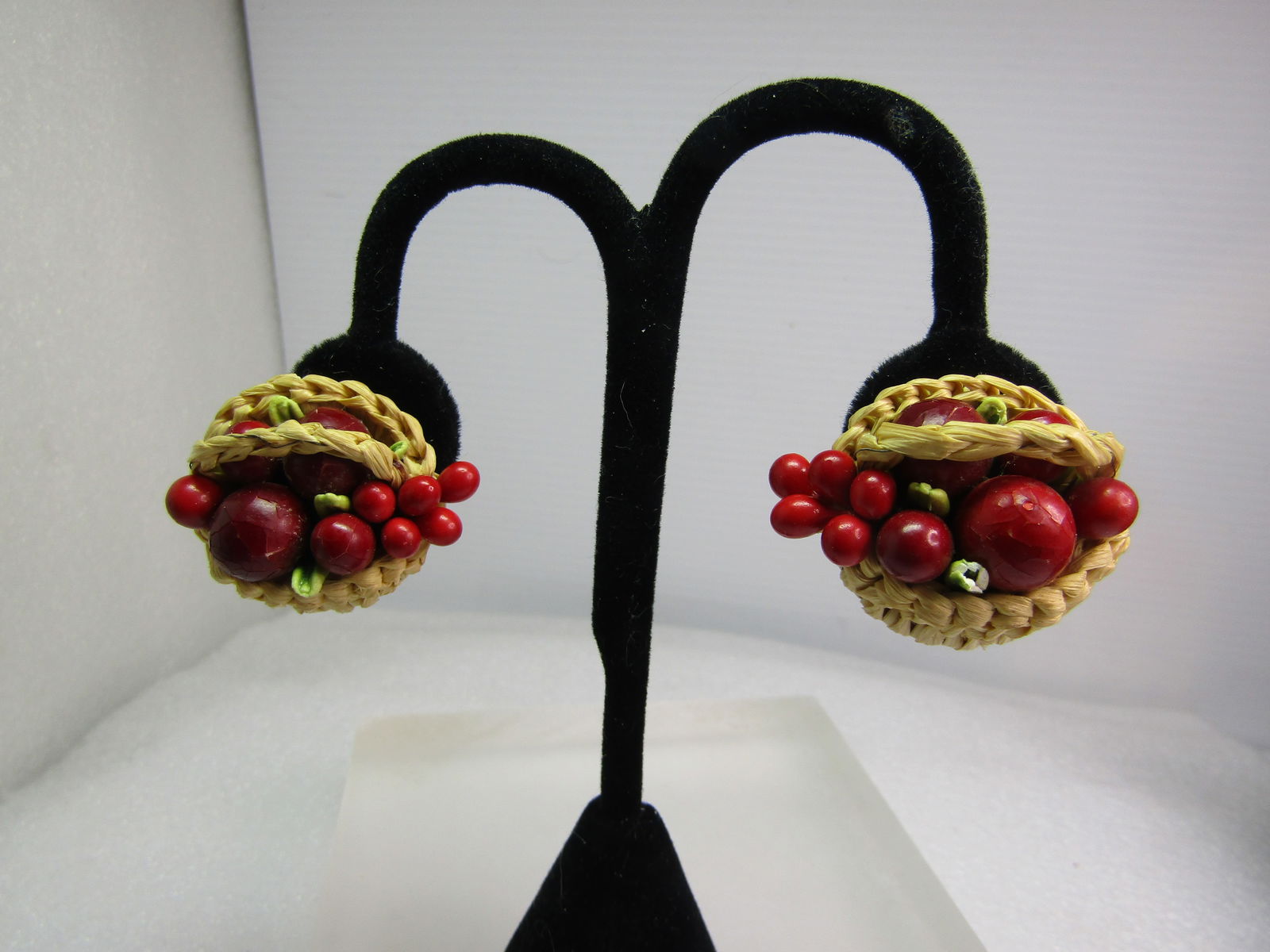 Vintage Fruit Basket Clip Earrings, W. Germany, Mid-Century: Vintage Fruit Basket Clip Earrings, W. Germany, Mid-Century. These are made with an acutal woven basket that is somewhat oval shaped with a handle that has what look like red apples, other red