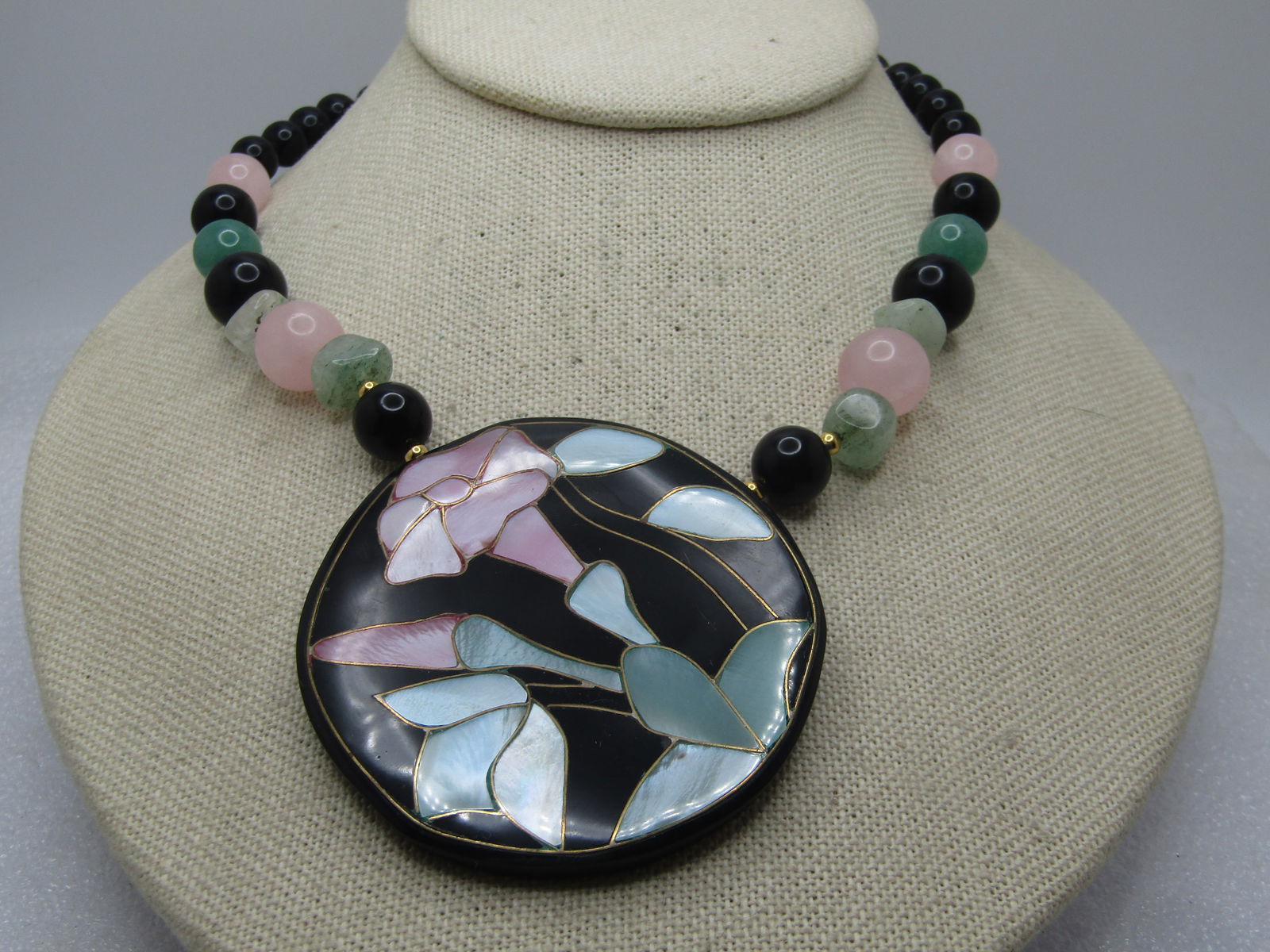 Vintage Inlaid Floral Necklace, Mother-of-Pearl, Quartz, Onyx, Jade - Lee Sands. 21", 1970's-1990's,: Vintage Inlaid Floral Necklace, Mother-of-Pearl, Quartz, Jade - Lee Sands. 21", 1970's-1990's, Original BoxMedallion style pendant with inlaid pink blossoms - lily-like - and green leaves. Brassy