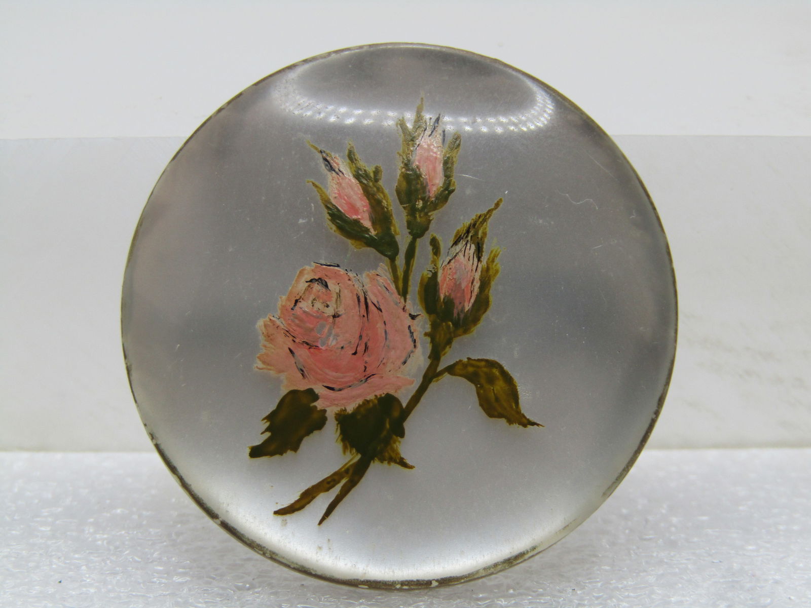 Vintage Faux MOP Rose Painted Brooch, 1940's-1950's: Vintage Faux MOP Rose Painted Brooch, 1940's-1950's. Domed, 1-3/8" round faux mother-of-pearl brooch with a painted rose blossom and three buds with leaves - pink and green and a gold tone painted