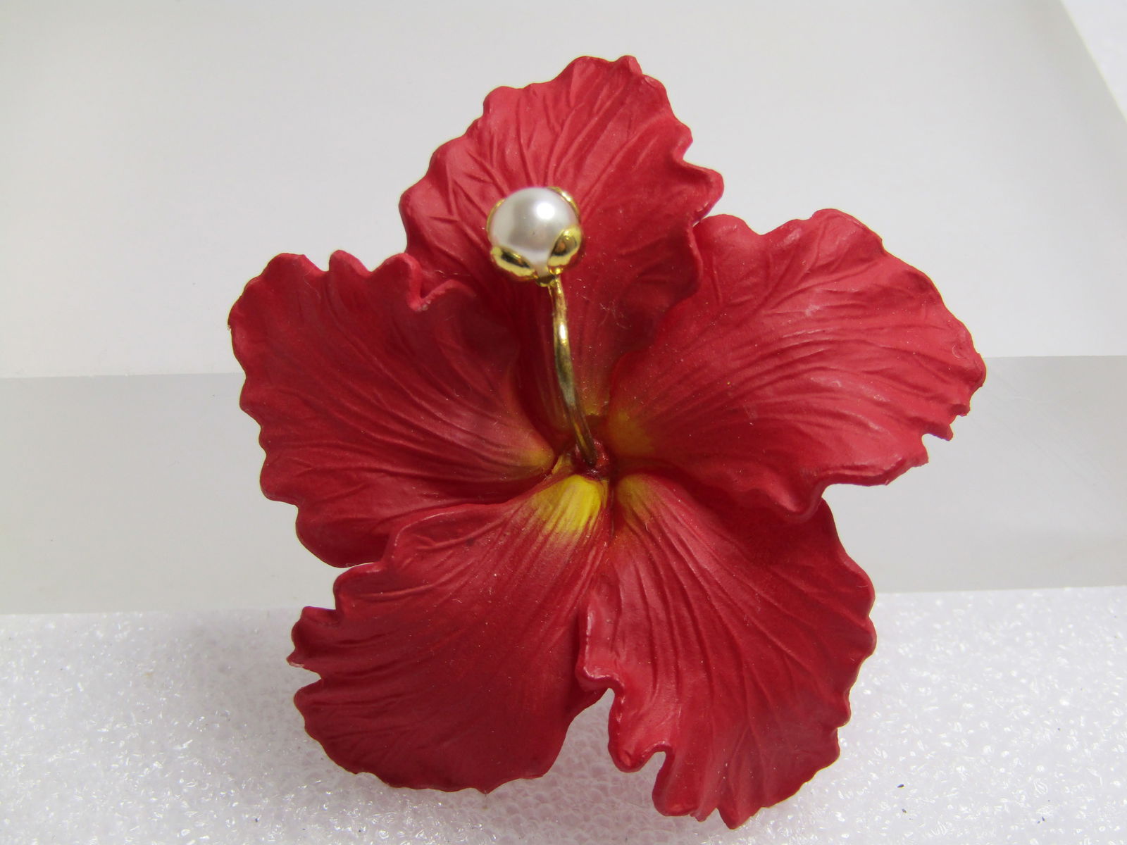 Vintage Red Hibiscus Blossom Brooch, Faux Pearl, Western Germany, Mid-Century: Vintage Red Hibiscus Blossom Brooch, Faux Pearl, Western Germany, Mid-Century. THis is believed to be appx. 1950's-1960's. It is a molded matte red curved plastic petal blossom with yellow accents at