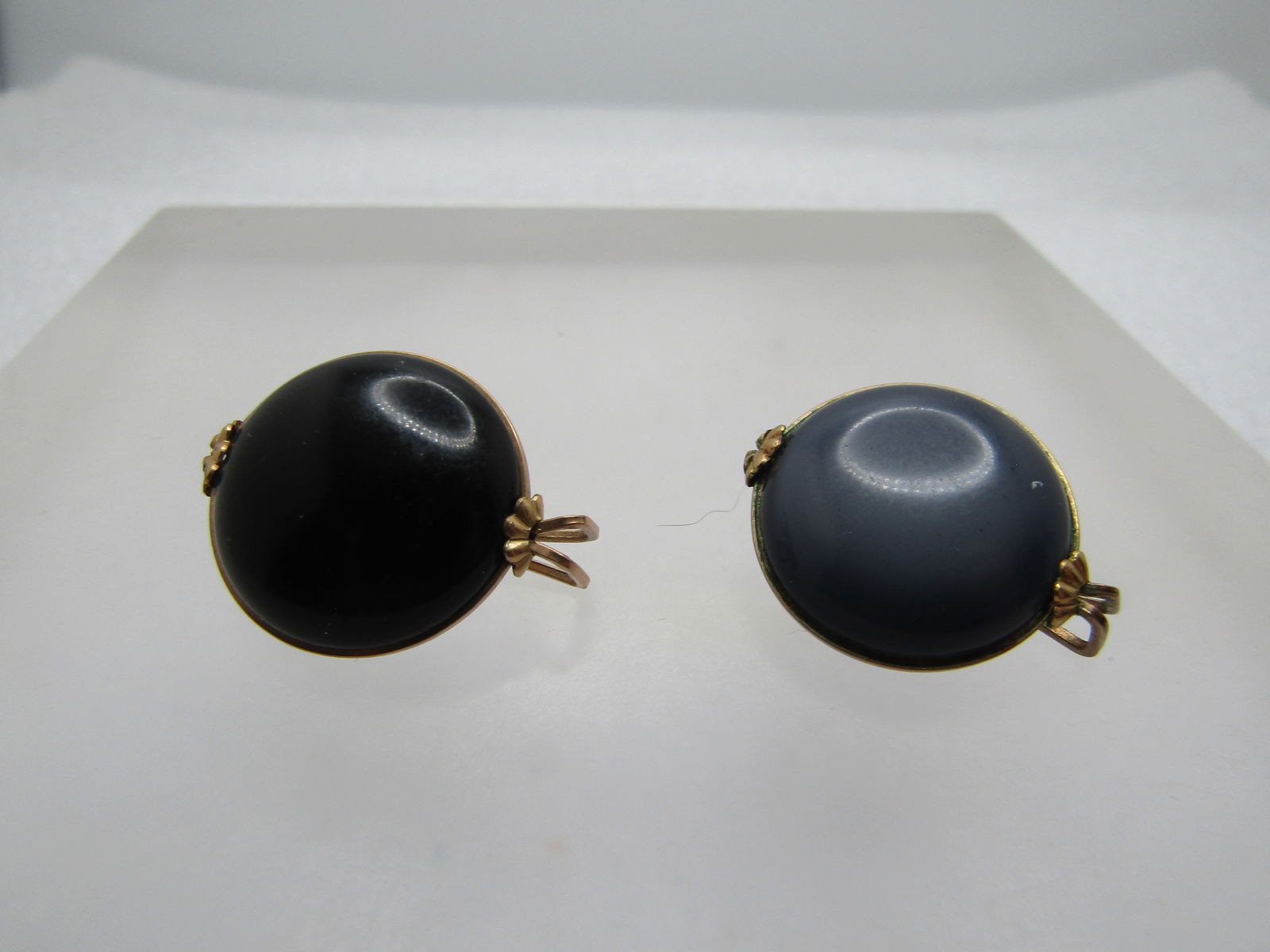 Vintage Red Rose & Rhinestone Brooch, C-Clasp, 1950's-1960's: Vintage Red Rose & Rhinestone Brooch, C-Clasp, 1950's-1960's. C-clasp. Gold tone stem and leaves with a red metal blossom with a center clear rhinestone. The brooch is appx. 1.25" tall and 7/8"