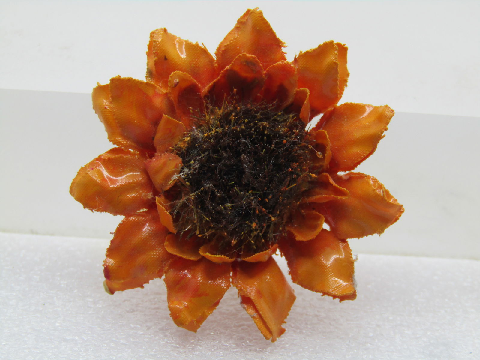 Vintage Sunflower Brooch, 1.75", Orange/Brown, 1970's-1980's: Vintage Sunflower Brooch, 1.75", Orange/Brown, 1970's-1980's. this has petals that looks like curved dried petals - they are not but the center is a dried brown flower to give it the look of a sunflow