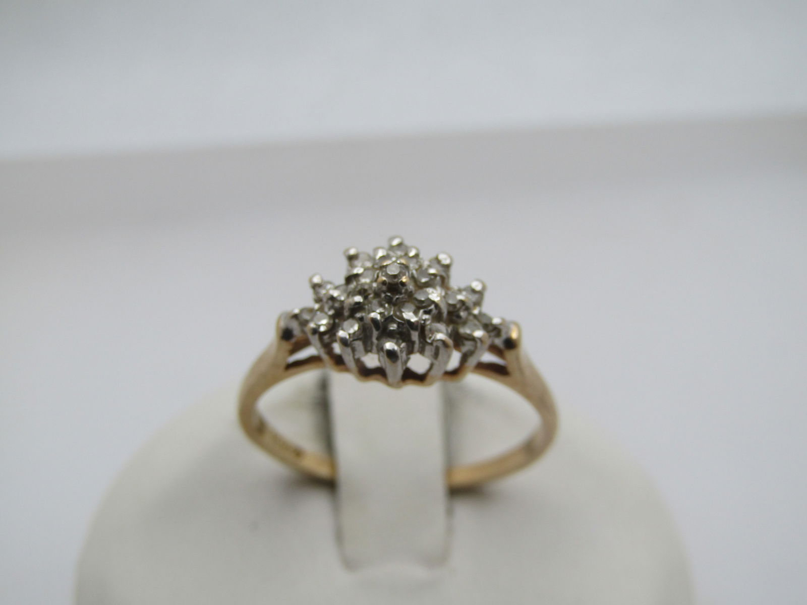 Vintage 10kt Diamond Ring, Sz. 7.5, 1960's-1970's Signed: Title:Vintage 10kt Diamond Ring, Sz. 7.5, 1960's-1970's SignedDescription:Vintage 10kt Diamond Ring, Sz. 7.5, 1960's-1970's Signed with a diamond outline with an F inside and marked 10kt. It is