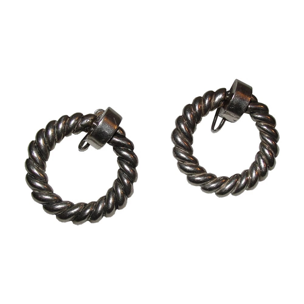 Los Castillos Taxco Mexico Sterling Hoop Dangle Earrings: Title:Los Castillos Taxco Mexico Sterling Hoop Dangle EarringsDescription:Great collectible and very wearable sterling twisted rope earrings by Los Castillos. Circa, 1940's. Earrings measure 1