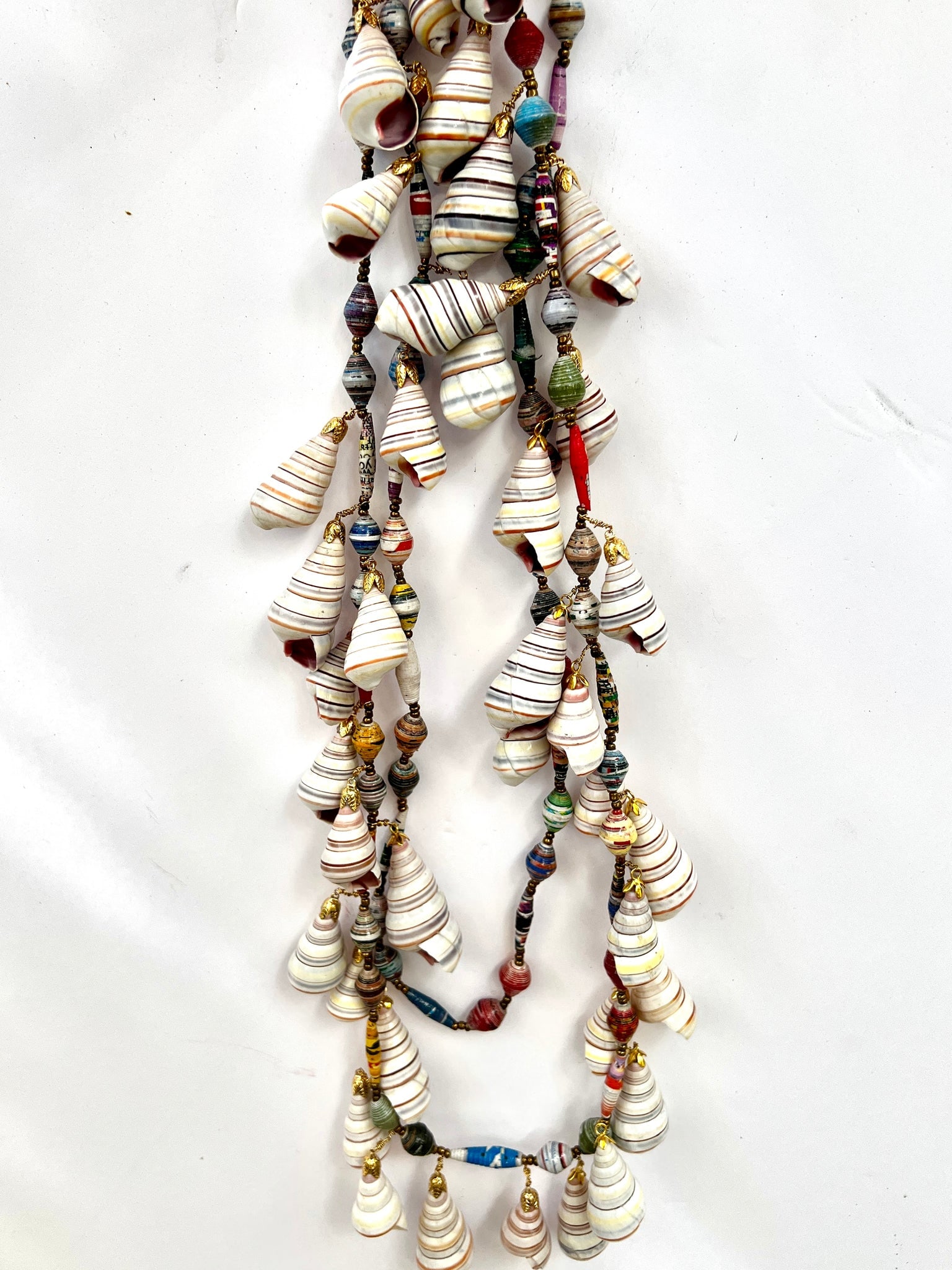 Circus Cone Shell Necklace with Paper Beads: Title:Circus Cone Shell Necklace with Paper Beads Description:Absolutely fun, this Lei is made of fascinating paper beads and hung with loads of Circus Cones - 65"Long Reserve: $380.00 Shipping: Domes