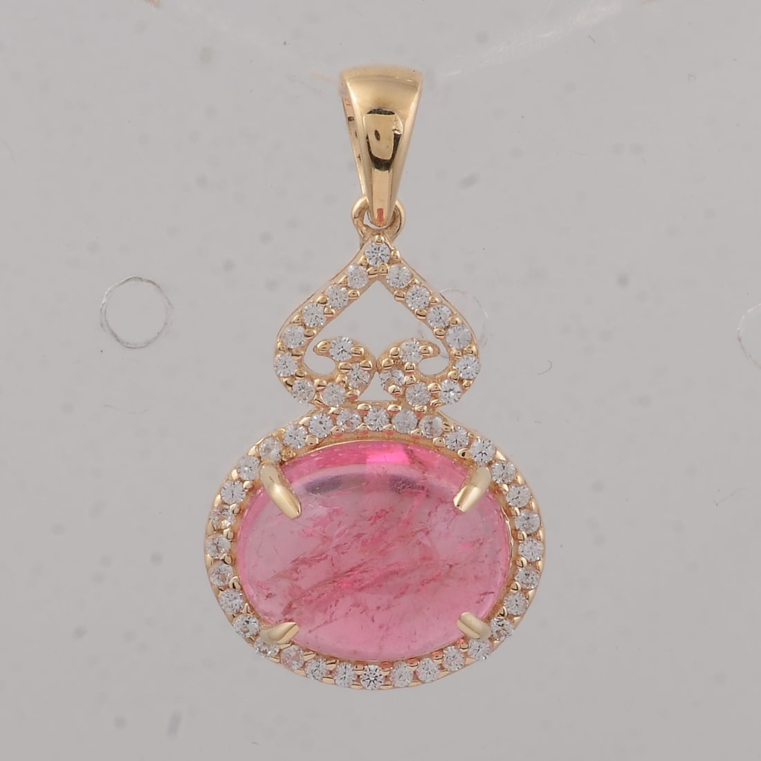 3.66 Ct Oval Tourmaline 9K Gold Pendant: Title:3.66 Ct Oval Tourmaline 9K Gold PendantDescription:3.66 Total Carat Tourmaline 9K Gold Pendant Specifications - Total Weight 1.81 g - Center Gemstone Tourmaline - Gemstone Carat Weight 3.45