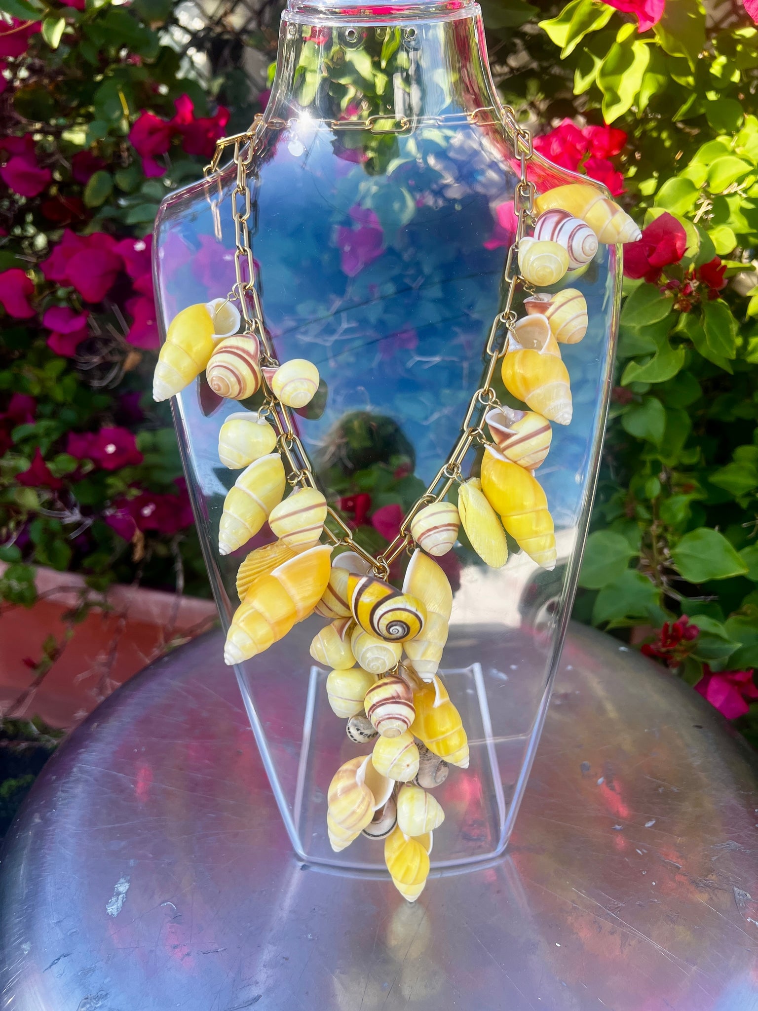 CSS Naturally Yellow Shell Necklace: Title:CSS Naturally Yellow Shell Necklace Description:Sunny long necklace made up of charming yellow snails from trees and the seas around the world. This is a very special piece and is light - Signed
