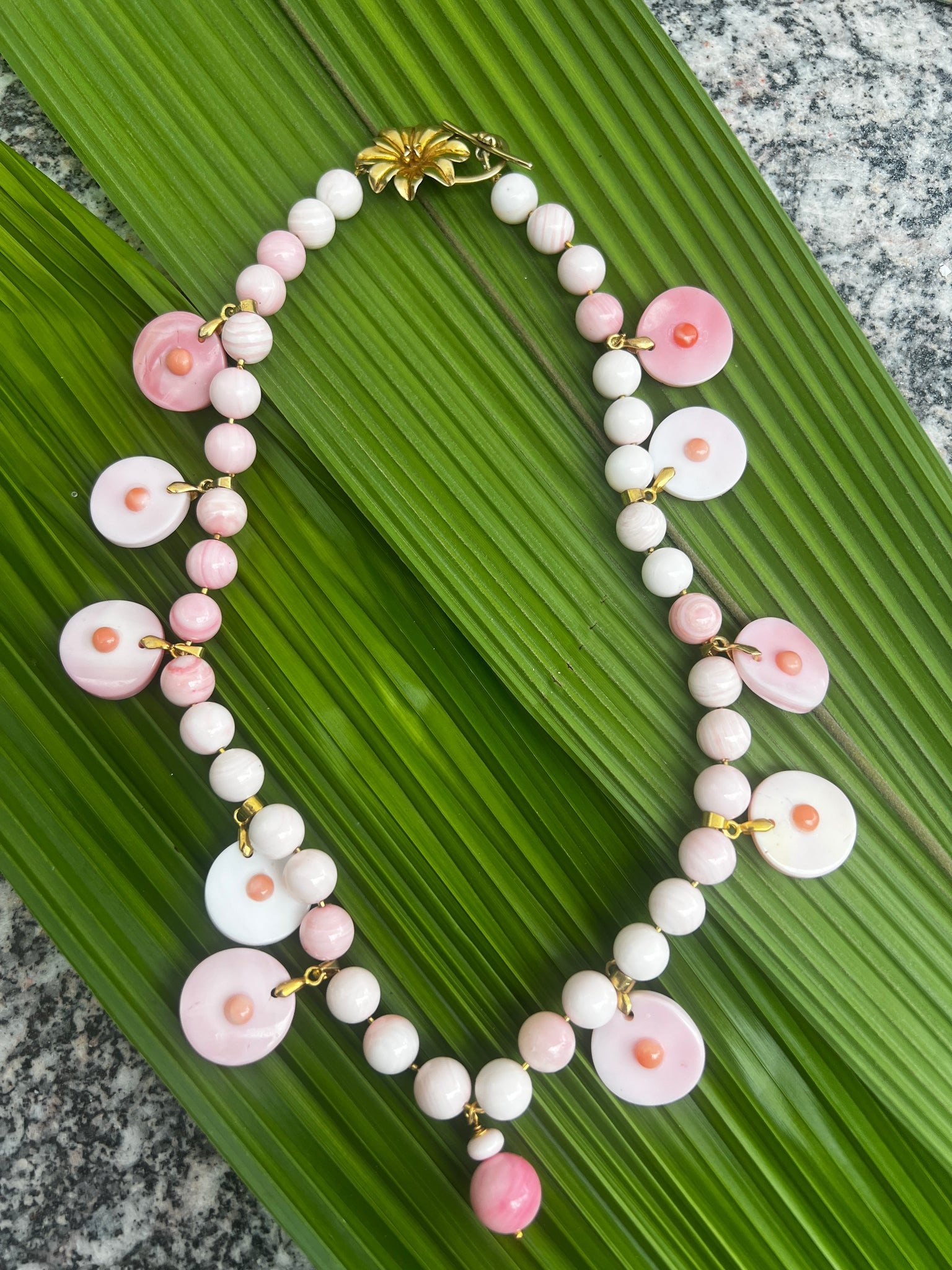 Conch Shell 16" Necklace with Coral: Title:Conch Shell 16" Necklace with CoralDescription:Pure Madame de Pompadour Pink! She would have loved Conch Shells, and this fun necklace as well. The bead in the middle is so very pink that I
