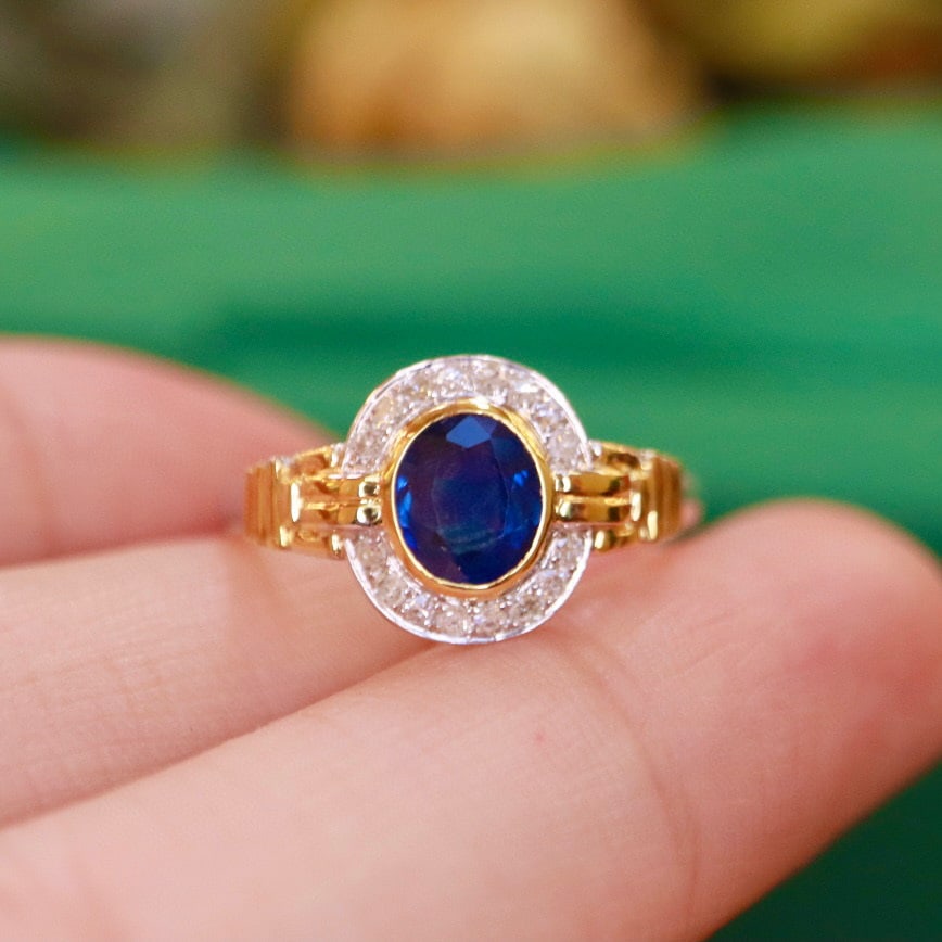 14K GOLD 0.91 CTW NATURAL SAPPHIRE & DIAMOND RING: Title:14K GOLD 0.91 CTW NATURAL SAPPHIRE & DIAMOND RINGDescription:Ref:230528490Gold Content:14K GoldRing Size:7.25USMain Gemstone:SapphireNumber of stones:1Shape:OvalCarat Weight:0.8ct