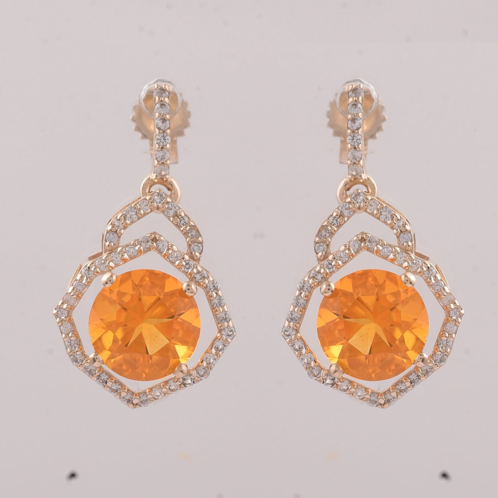2.10 Ct Round Br.Opal 9K Gold Earrings: Title:2.10 Ct Round Br.Opal 9K Gold EarringsDescription:2.10 Total Carat Br.Opal 9K Gold Earrings Specifications - Total Weight 2.121 g - Center Gemstone Br.Opal - Gemstone Carat Weight 1.73 Carats -