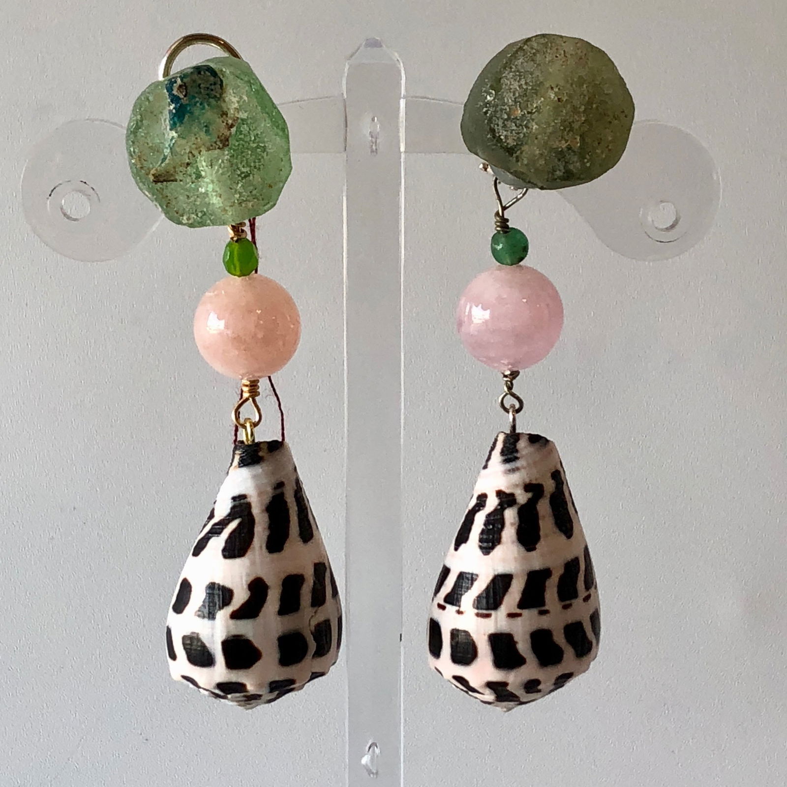 Ancient Roman Glass and Beryl Earrings: Title:Ancient Roman Glass and Beryl EarringsDescription:Super Model Rosie Huntington used a pair of these in a bathing suit photo shoot in the Bahamas. She just loved them so much she kept them! One