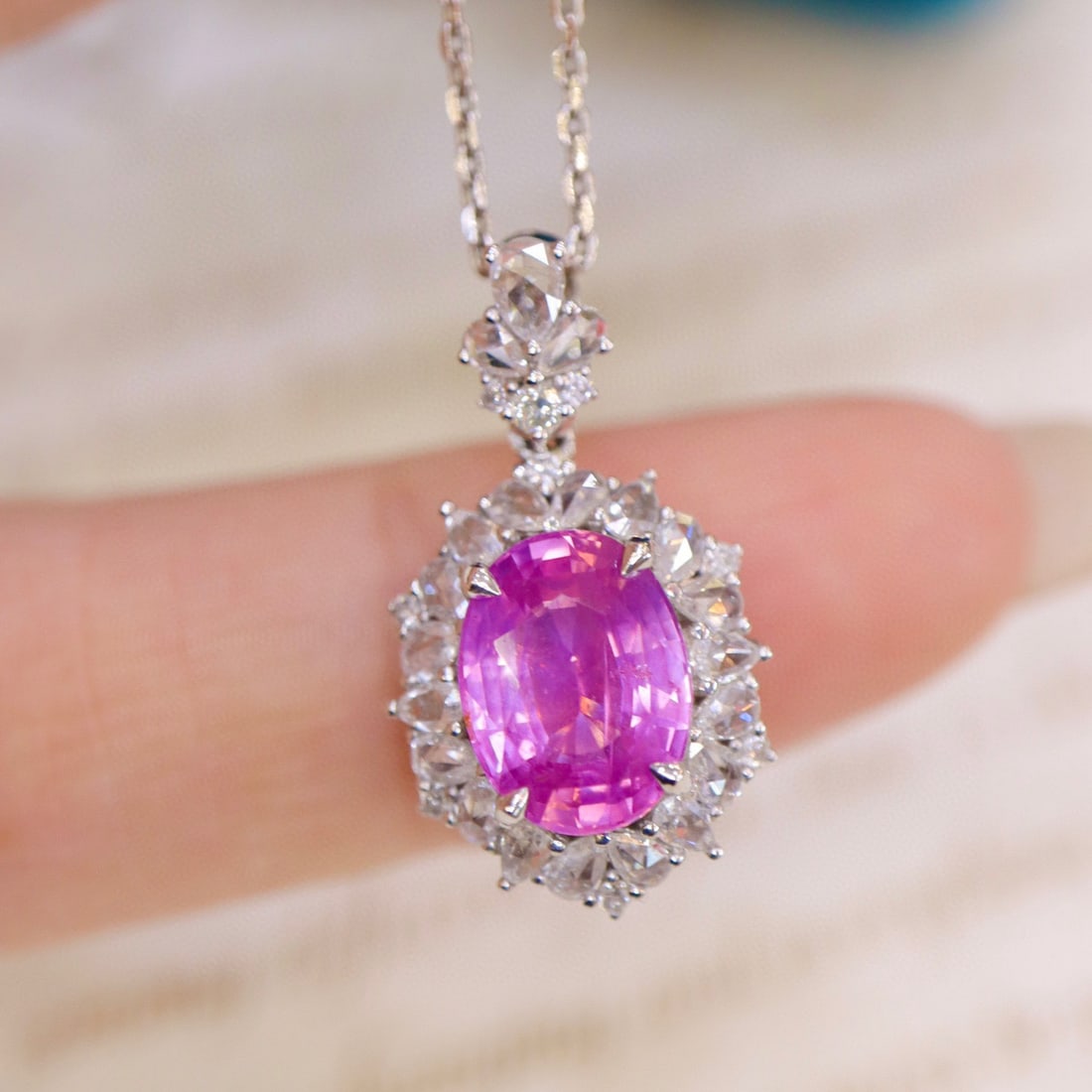 14K GOLD 2.49 CTW NATURAL SAPPHIRE & DIAMOND PENDANT: Title:14K GOLD 2.49 CTW NATURAL SAPPHIRE & DIAMOND PENDANT Description:Ref:230528444Gold Content:14K GoldMain Gemstone:SapphireNumber of stones:1Shape:OvalCarat Weight:2.09ct Color:PinkTreatment:Natur