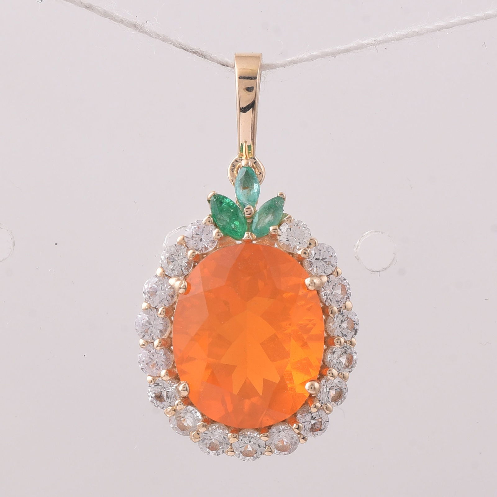 3.46 Ct Oval Fire Opal 9K Gold Pendant: Title:3.46 Ct Oval Fire Opal 9K Gold PendantDescription:3.46 Total Carat Fire Opal 9K Gold Pendant Specifications - Total Weight 1.722 g - Center Gemstone Fire Opal - Gemstone Carat Weight 2.58